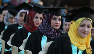 Iraqi students attend their graduation ceremony at Technical University of Baghdad on June 30, 2012 to celebrate receiving their degrees for the first time since the US-led war on Iraq in 2003. The ceremonies were officially stopped by authorities due to the security issues after several attacks and explosions took place at the university since the ousting of former president, Saddam Hussein in 2003. AFP PHOTO/AHMAD AL-RUBAYE        (Photo credit should read AHMAD AL-RUBAYE/AFP/GettyImages)