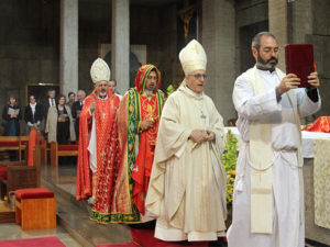 Chaldean Archbishop Yousif Mirkis of Kirkuk, Iraq, second from right, celebrates mass on April 19, 2015 in Madrid, Spain.  Photo courtesy of HazteOir.org via Creative Commons